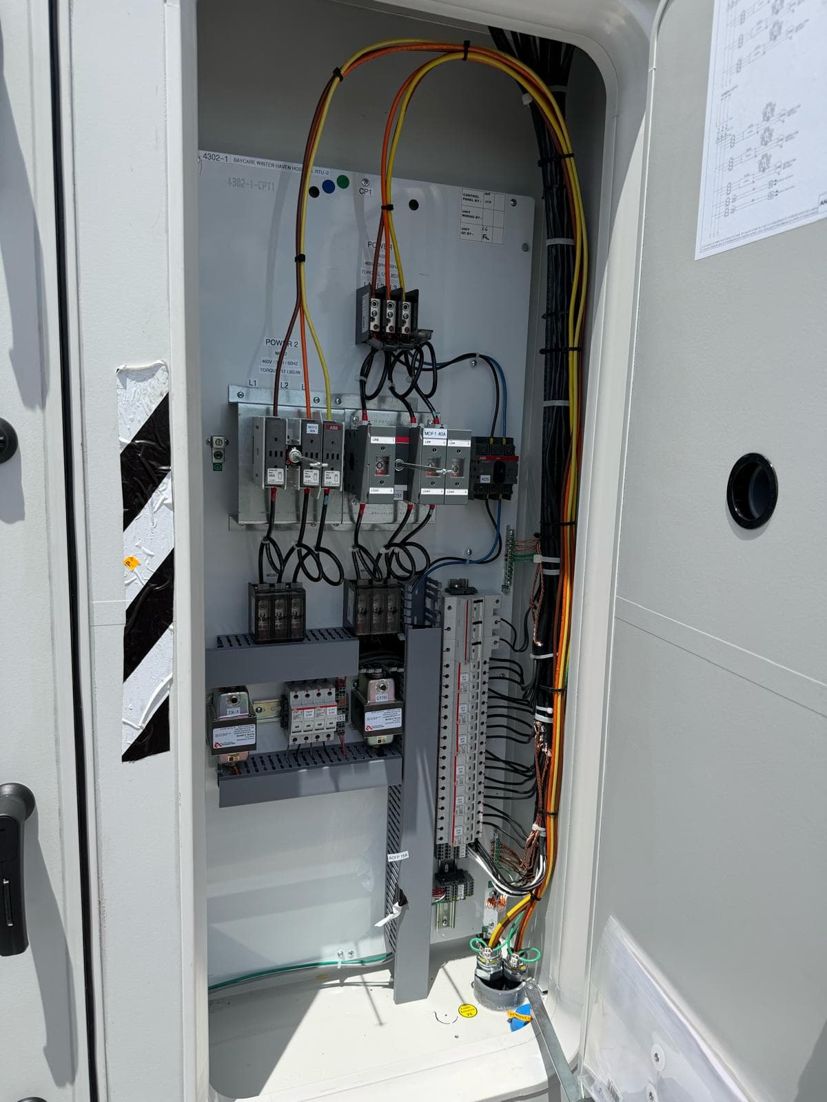 Labeled control cabinet interior